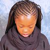 Frau mit lockigen Open Braids (French Deep)